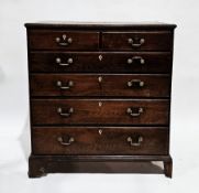 George III oak chest of two short over four long graduated drawers, each drawers with bone