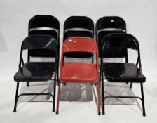 Six Ikea ' Malko ' metal folding chairs, one red and five black