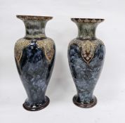 Large matched pair of late 19th century Royal Doulton oviform vases, decorated with lappet-shaped