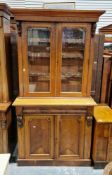 Victorian glazed library bookcase, the moulded cornice over two glazed doors with moulded edge