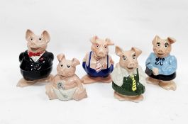 Set of five vintage Wade Nat West piggy banks, each with moulded marks and black plastic stoppers to