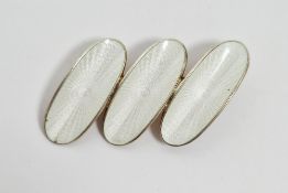 Norwegian sterling silver and white enamelled brooch by David Andersen, formed from three joined cup