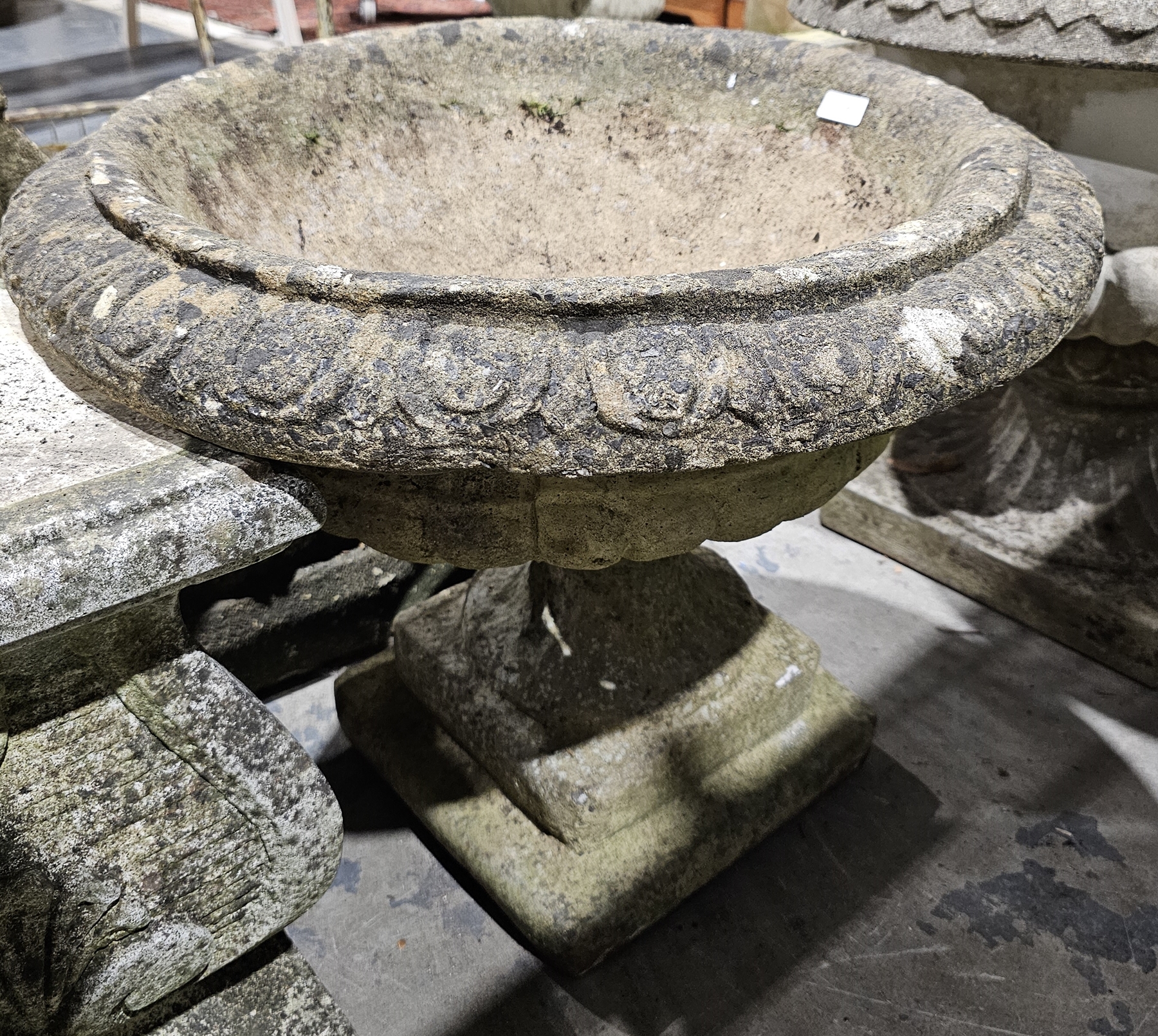 Pair of composite stone garden terrace urns of campana form, with moulded egg and dart rim, on a - Image 2 of 2