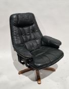 20th century Ekornes-style Stressless swivel armchair, upholstered in green leather, on five splayed