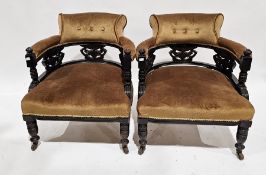 Pair of Victorian salon tub armchairs, each with foliate pierced carved splats, the buttonback, arms