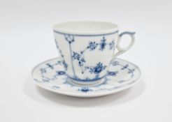 Royal Copenhagen blue and white lace-pattern teacup and saucer, printed blue and green marks,