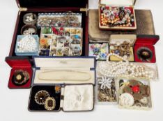 Collection of costume jewellery including necklaces, earrings, bangles, beads, simulated pearls,