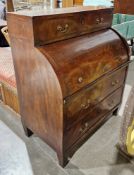 19th century mahogany cylinder bureau with a single long drawer over, opening to reveal pull-out