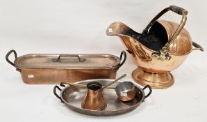 Victorian copper and brass handled coal scuttle of helmet form, a copper pouring vessel, another