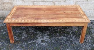 20th century hardwood coffee table of rectangular form, with inlaid parquetry border, on four square