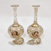 Pair of late 19th century Bohemian decanters and stoppers, in the Moser-style, one with etched crown