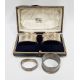 Pair of George V silver cased napkin rings, Chester 1922, J & R Griffin, of oval form with cast - Image 1 of 4