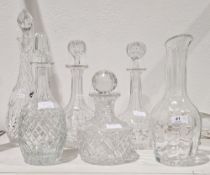 Collection of decanters including a pair of Victorian globe and shaft examples cut with lenses, 30cm