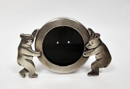 Silver-mounted photograph frame by Tiffany & Co, the circular frame held by two bears, stamped '