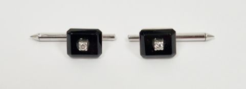 Pair of Art Deco style 14k white gold shirt studs, each set with a diamond on an onyx panel, stamped