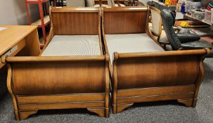 Two stained wooden veneered framed single sleigh beds (2)  Condition Report Surface scratches,