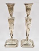 Pair of silver candlesticks, Birmingham 1960, maker Sanders & MacKenzie, of square baluster form