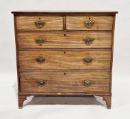 George III mahogany chest of two short over three long graduated cock-beaded drawers, the brass drop
