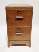 Early to mid-20th century oak two-drawer office filing cabinet, each drawer with oak block handle