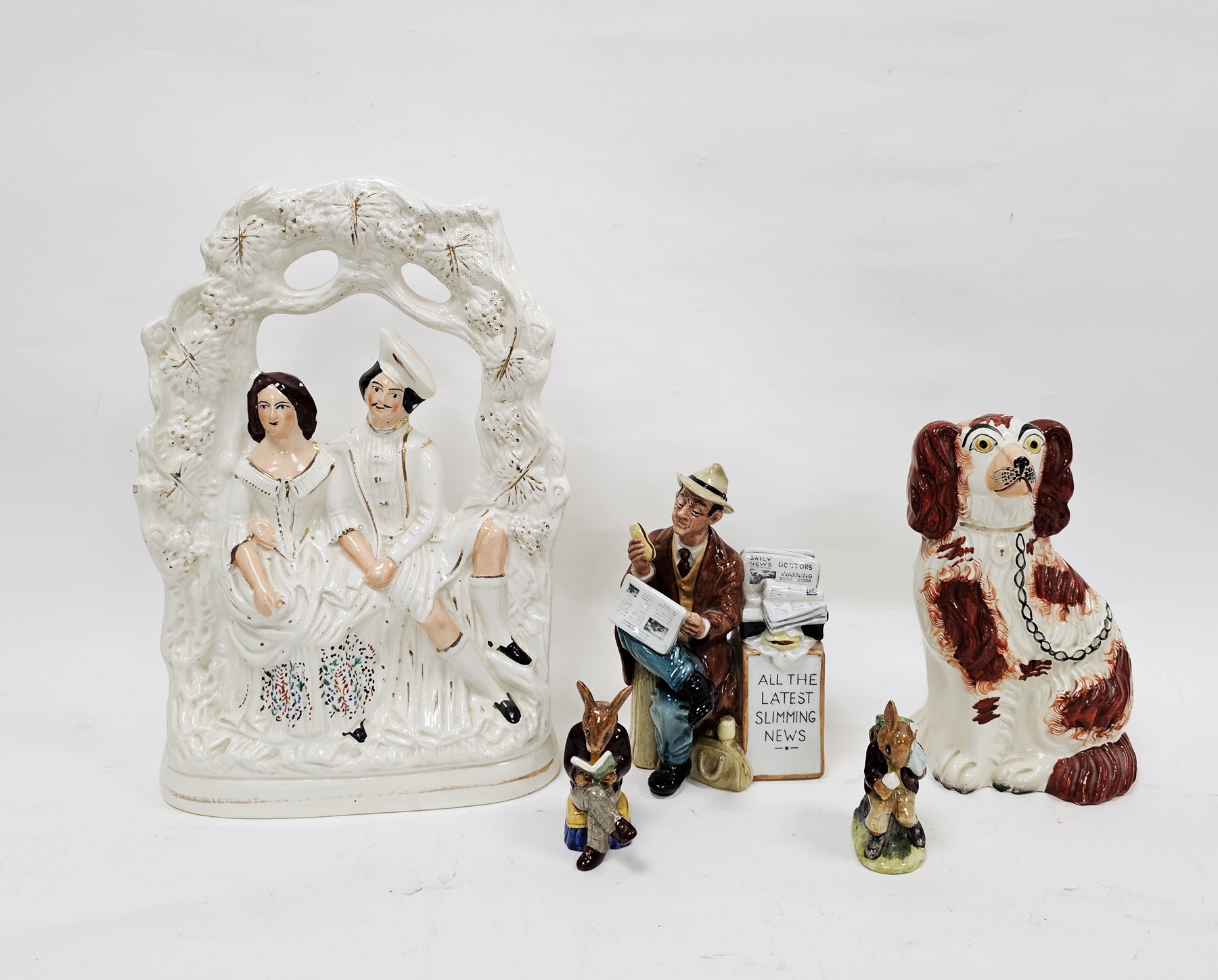 Late 19th century Staffordshire pottery arbour group with gentleman and companion, a Staffordshire