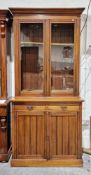 Late 19th / early 20th century mahogany glazed library bookcase, the moulded cornice over two glazed