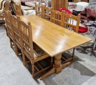 Pale oak dining room suite comprising a refectory table in the 17th century manner, the plank top on