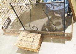 Cast-iron fire screen, a metal fender pierced with ovolos, probably steel (corroded) and a wicker