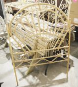 Retro wicker peacock shaped single bedhead with scrolling interlocking feather like ornament, 134.