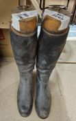 Pair of men's leather riding boots fitted with a wooden boot tree