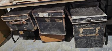 Two vintage leather bound travelling trunks, one with studs the other with leather strap handles,