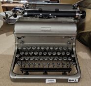 Royale typewriter in silver painted finish with cover