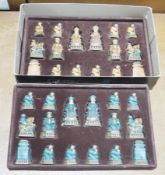 Chess set, the resin game pieces in the form of Chinese court nobles and with wooden chess board