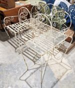 White painted metal garden suite comprising a bench, two armchairs and a glass topped table (4)