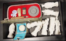 Collection of white porcelain figures including Chinese ladies, gentlemen and immortals, a blue