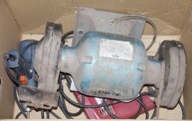 Evolution hand operated circular saw, a Clarke bench grinder with 240v motor, serial number