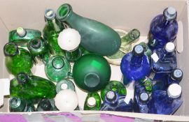 Collection of blue and green glass bottles together with five ceramic vases, two ceramic jugs and