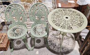 Green painted circular metal garden table and two chairs (PLEASE NOTE VAT WILL APPLY ON THE HAMMER
