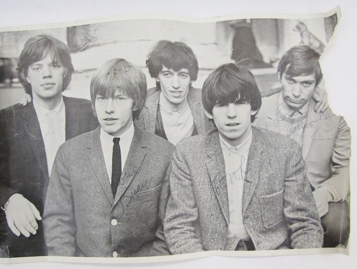 Signed publicity poster of the Rolling Stones, signed in blue pen by Brian Jones, Keith Richards and