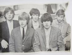 Signed publicity poster of the Rolling Stones, signed in blue pen by Brian Jones, Keith Richards and