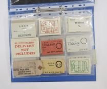 Railwayana - album containing a selection of railway train luggage labels from the Great Western