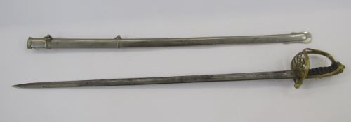 Victorian officer's dress sword with brass guard, fish skin grip, engraved blade and plated