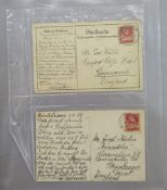 Swiss stamps: Two large stock-books & postcard album. Brown stockbook contains definitives,