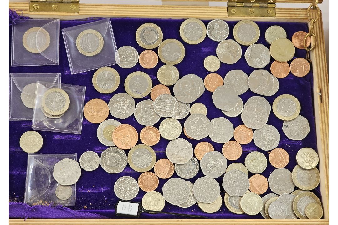 An accumulation of British and world coins, various £2, £1 and 50p's, together with currency two and - Image 2 of 3