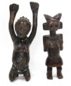 Two African tribal statues, a possibly late 19th/early 20th century Congolese Luba peoples carved