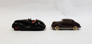 Schuco Examico 4001 clockwork car mad in U.S. zone Germany together with a Dux clockwork BMW car (