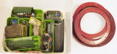 Quantity of vintage Meccano including various coloured straights, nuts, bolts, curved edges,