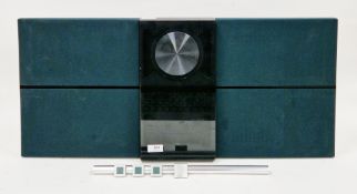 Bang & Olufsen BeoSound Century CD and cassette music system and a Bang & Olufsen Beotime flute