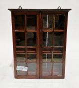 19th century mahogany hanging wall cabinet, the two glazed doors opening to two fixed shelves,