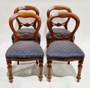 Set of four mahogany balloon back dining chairs in the Victorian manner, the stuffover seats with