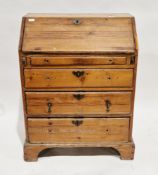 Georgian pine bureau, the fall front housing various pigeonholes and drawers over four drawers, with